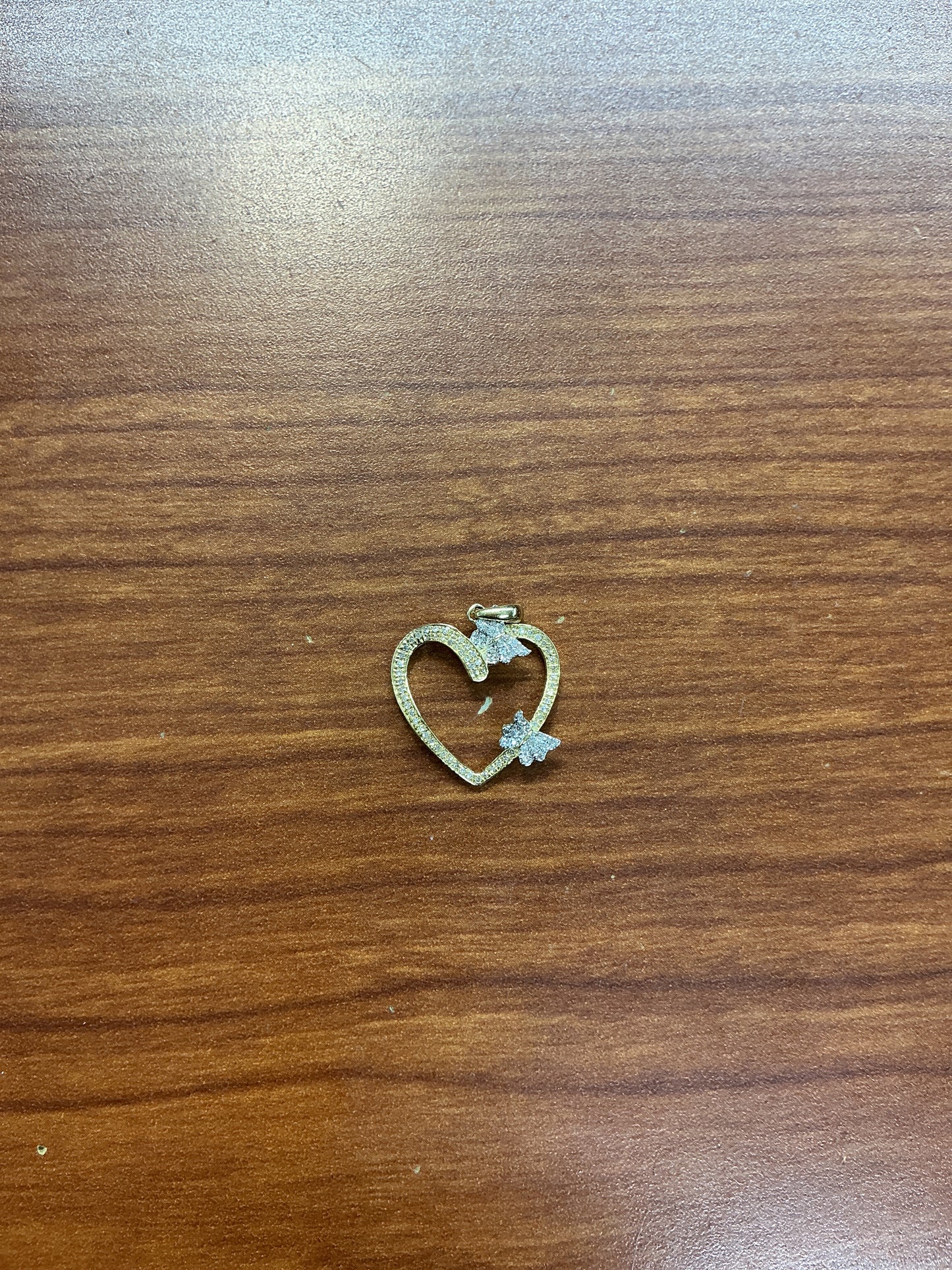 10k yellow gold heart w/butterfly 0.15 diamonds